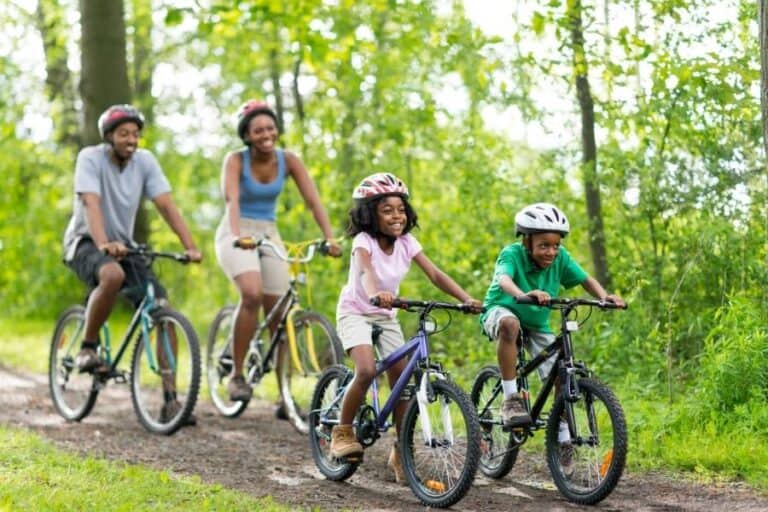 Family Being Healthy Riding Bikes Together