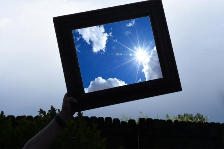 Picture of Blue Skies with Gray Skies Behind Representing Optimism